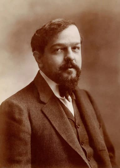 Claude Debussy: Photograph of Claude Debussy by Atelier Nadar (the studio of Nadar ). From Album de référence de l'Atelier Nadar. Vol. 13. Albumen print from a silver bromide