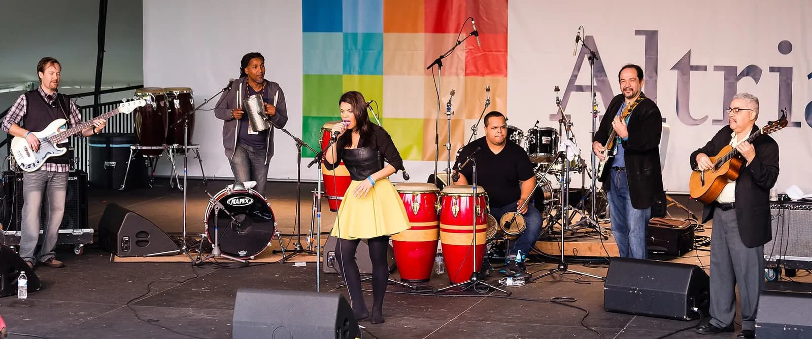 Dominican Republic: Richmond Folk Festival 2015 Andre Veloz (center) is a singer from the Dominican Republic based in New York City. Her musical specialty is "bachata," a style